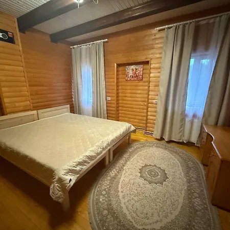 будиночок біля річки Дом отдыха